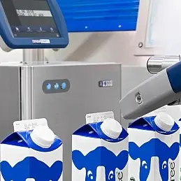 domino ax-series printing on milk cartons